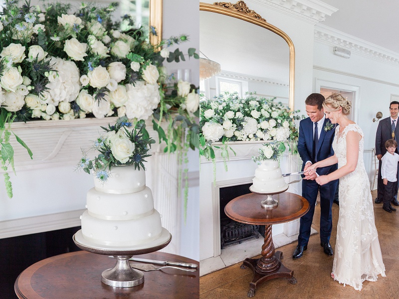 Couple Cutting Their Blue and White Topped Wedding Cake At Belair House