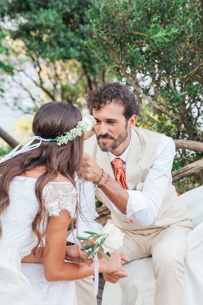 Bride and Groom Sharing an Emotional Moment During the Readings At Their Bohemian Wedding