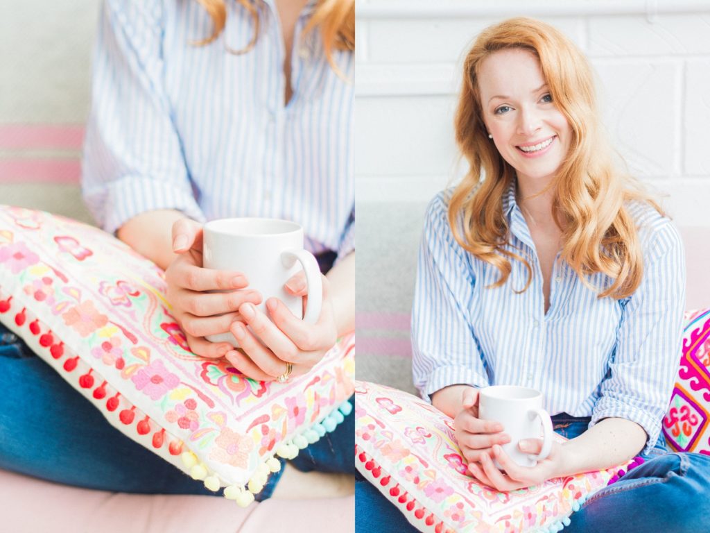 Bride to be smiles while holding a coffee cup and a colourful cushion