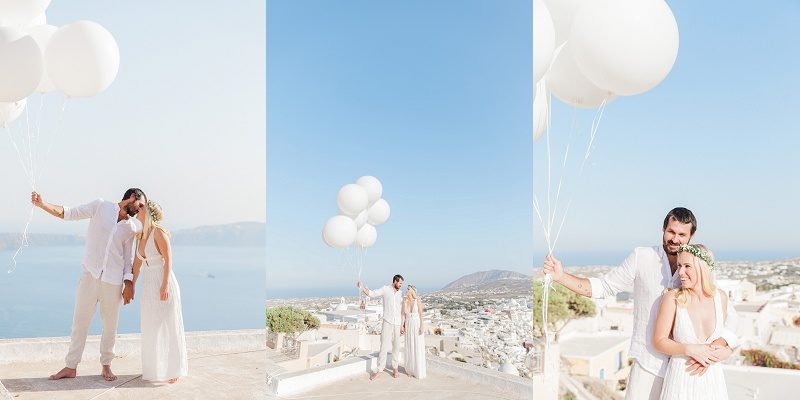 Bride and Groom with Giant White Balloons in Santorini