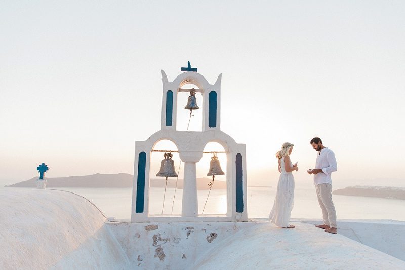 Couple Exchanging Vows On a Church Roof in Santorini