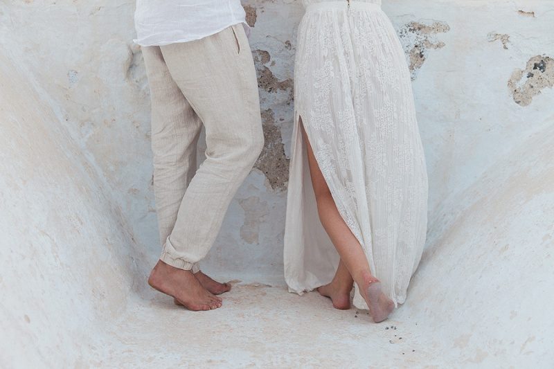 Barefoot Newlyweds on a Church Roof After Their Sunset Elopement In Santorini