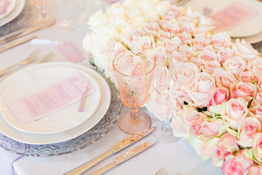 Wedding table setting with pink and white David Austin roses styled by Pearline Events