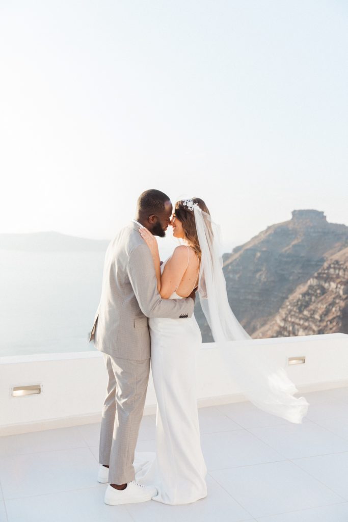Couples first dance during their elopement at Dana Villas Santorini