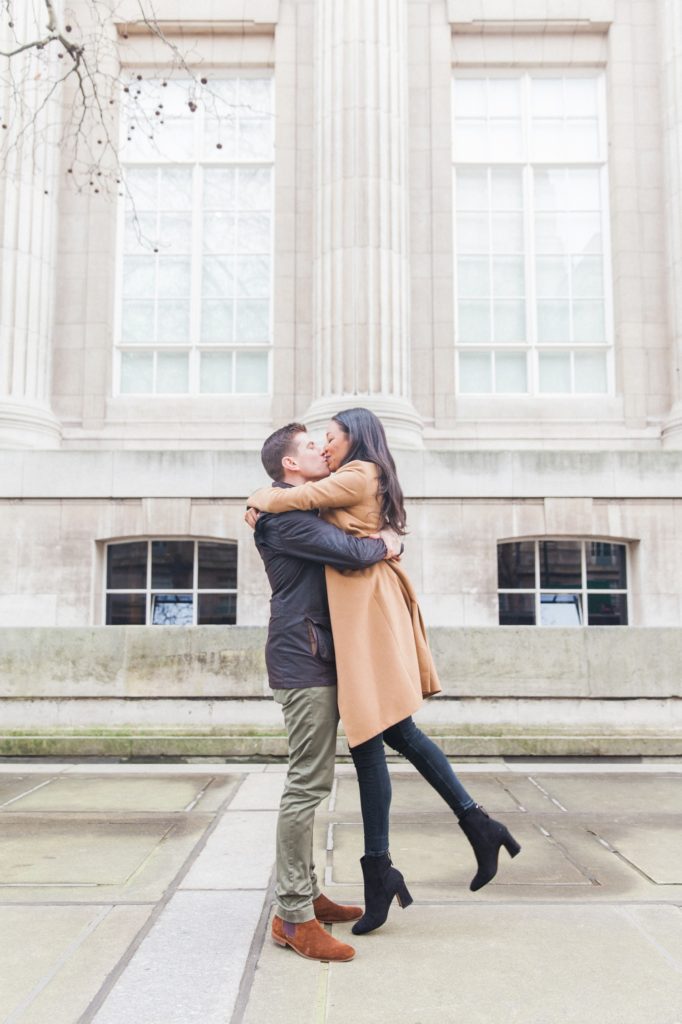 Couple kissing outside the British Museum in London