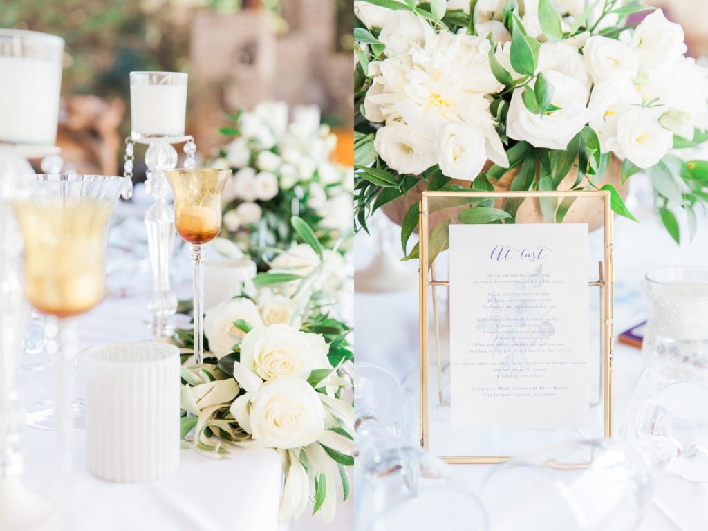 Candles and poetry with white and green wedding centrepieces