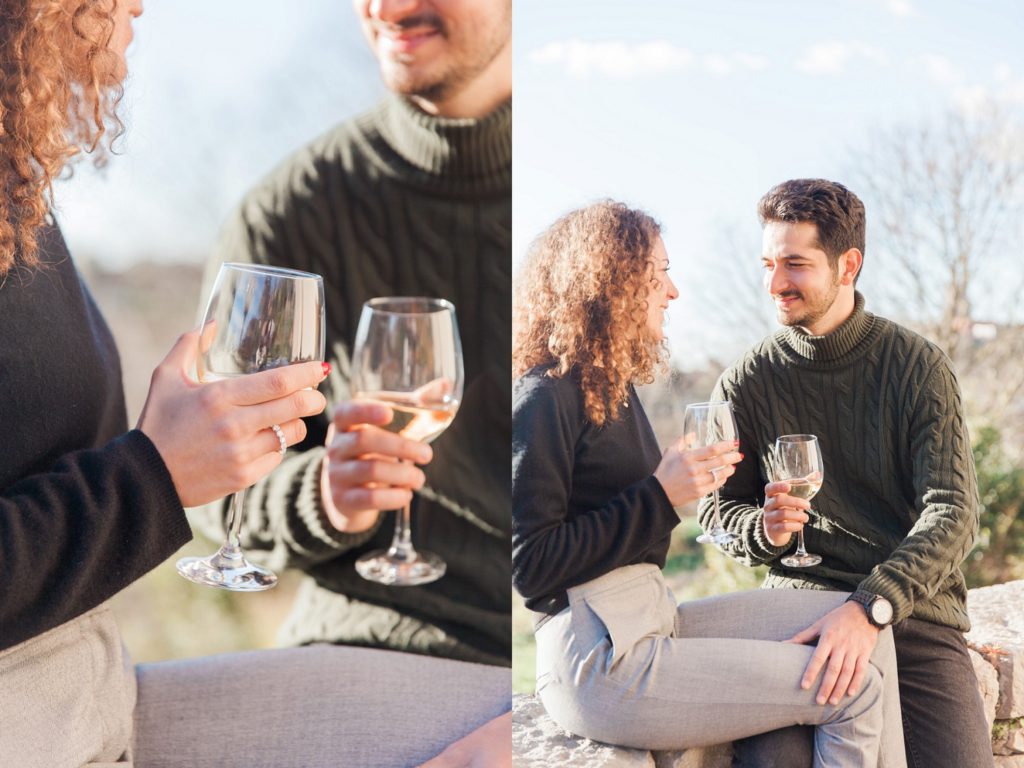 Couple share a glass of wine during their Italian countryside couple photography session
