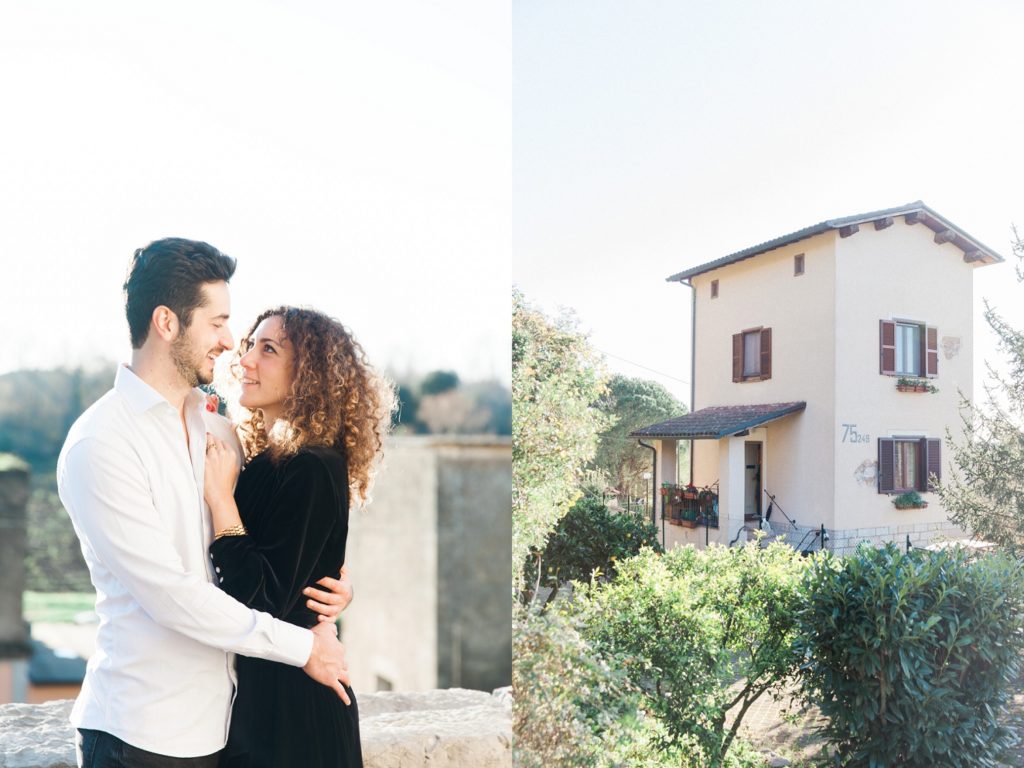 Couple next to a refurbished railway house in Sermoneta, Italy