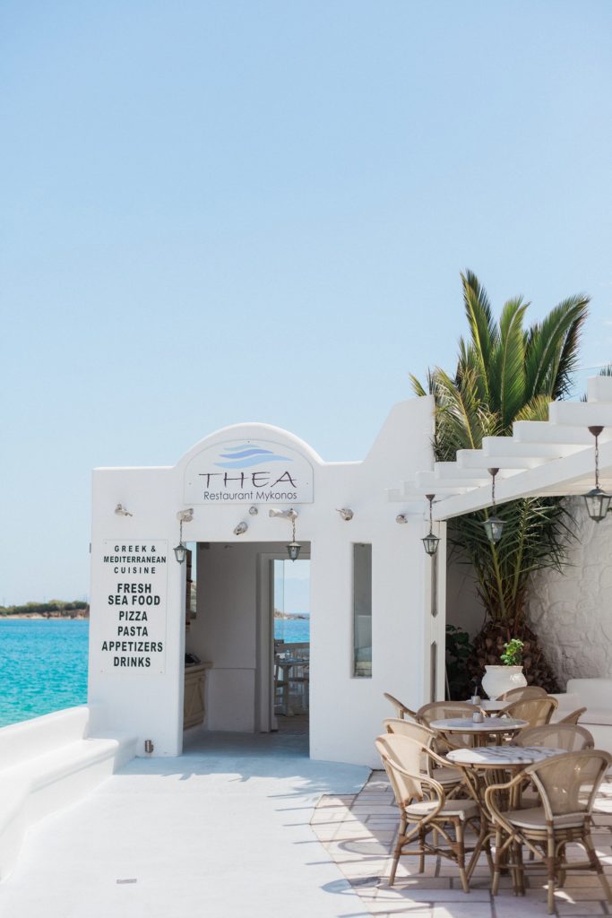 The whitewashed entrance of Thea Restaurant Mykonos
