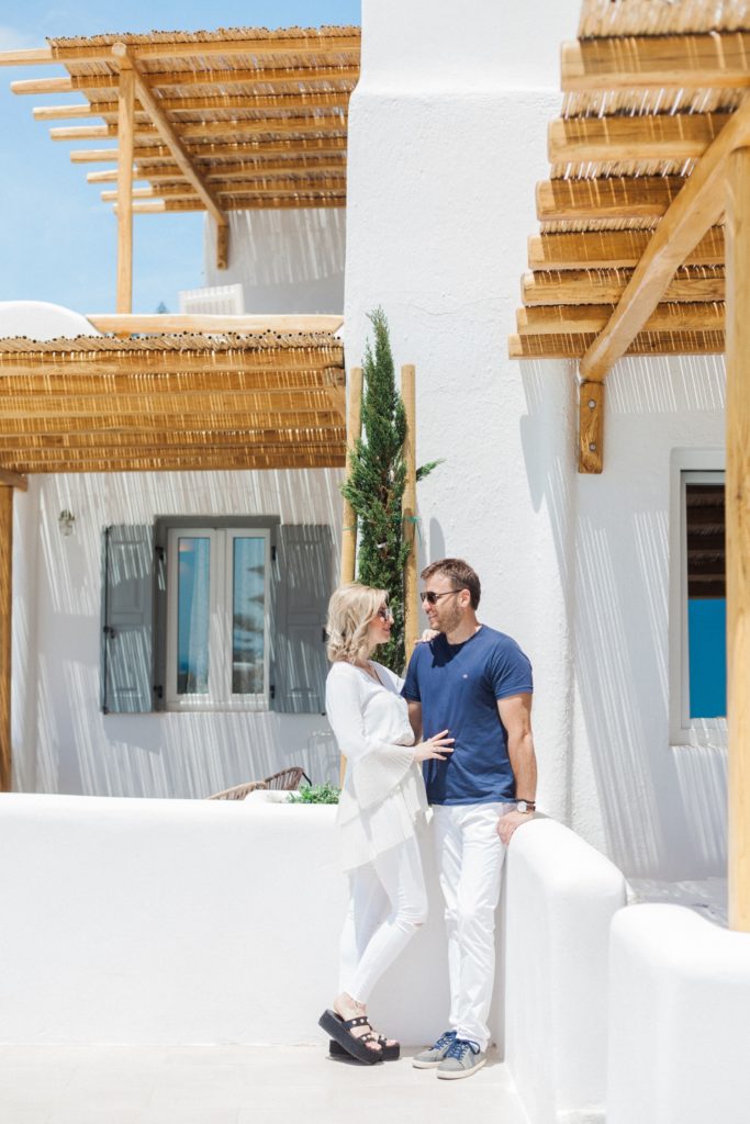Couple embrace in front of one of the suites at Artemoulas Studios Mykonos