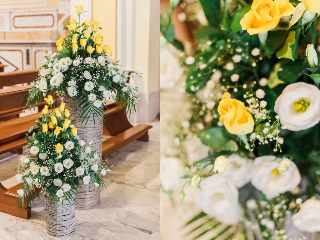 White and yellow roses and decor in a traditional Italian church in the village of Chieuti in Apulia