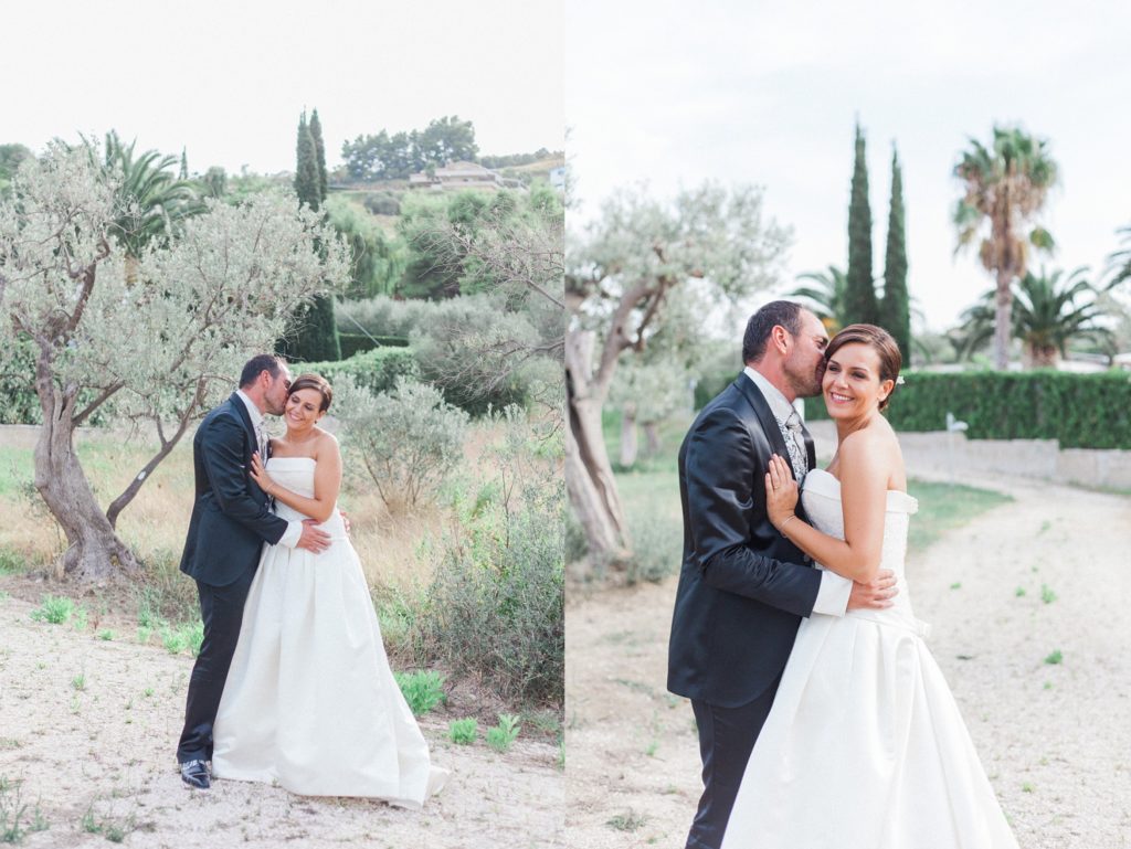 The bride and groom in the gardens of the Convivium Hotel in Vasto during their Abruzzo wedding