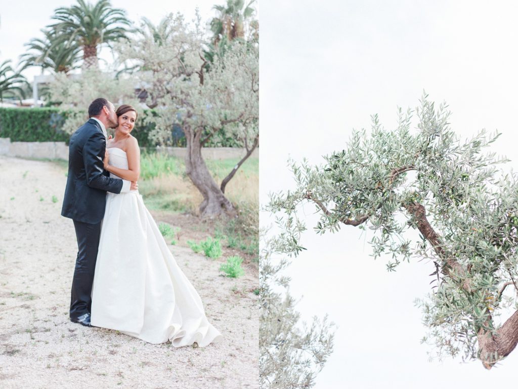 Bride and groom stand together in the gardens of the Convivium Hotel in Vasto during their Abruzzo wedding