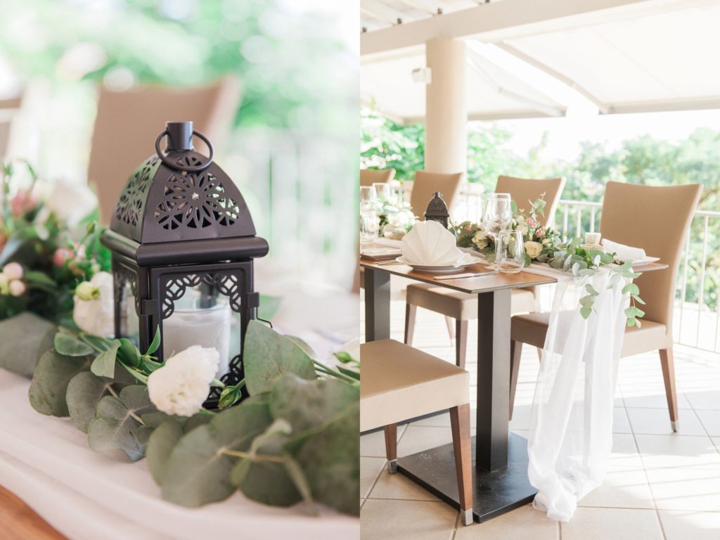 Wedding table decor with sand coloured leather chairs and black lantern centrepieces at Domotel Agios Nikolaos in Sivota