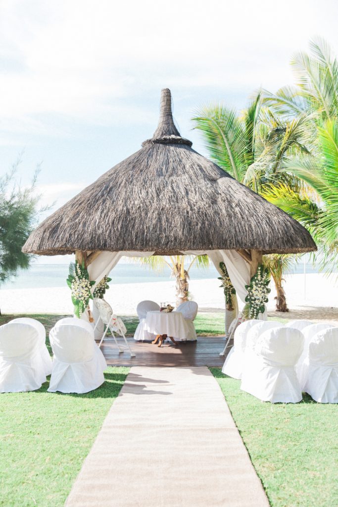 Thatched wedding ceremony area at Dinarobin Beachcomber Golf Resort & Spa in Mauritius