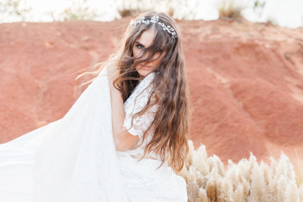 Bride dances in her Chanelle Wright wedding gown in the Red Desert