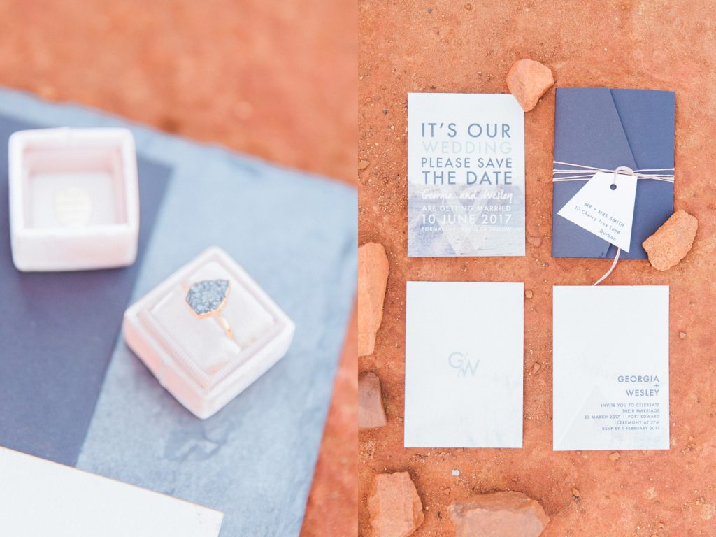 Detail image of the brides blue engagement ring and geometric wedding stationery by Bash Paperie