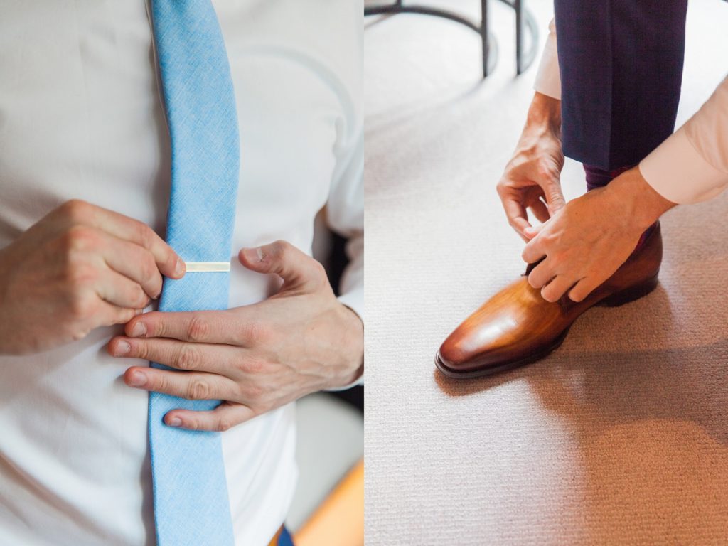 Groom fastening his tie and putting on his shoes on the morning of his wedding