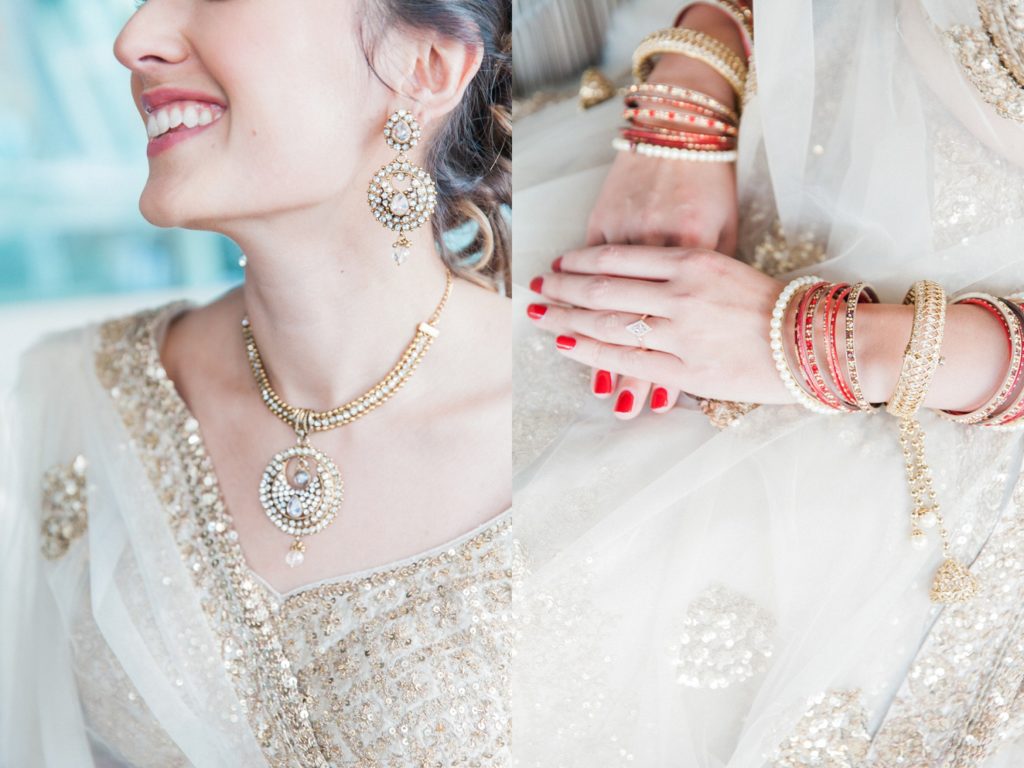 Bridal details showing her traditional Indian gold jewellery and bangles