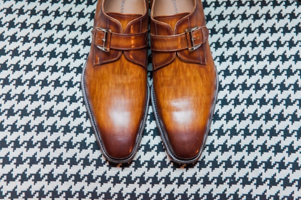 Detail image of the grooms shoes on the morning of his wedding