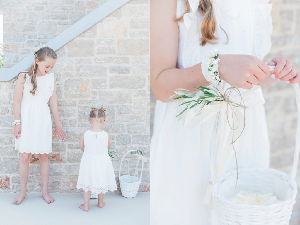 Flower girls collecting their confetti baskets before the elopement begins