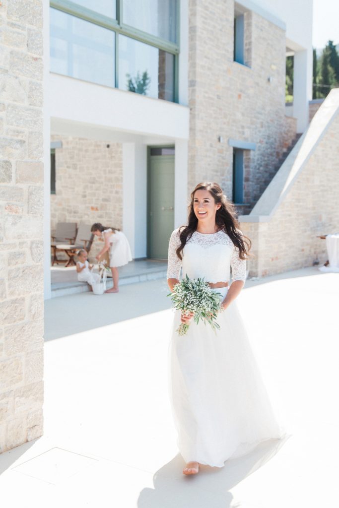 Bride arriving at her villa elopement ceremony on Lefkada