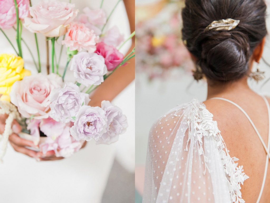 Bride holds a spring wedding arrangement while showing off her antique hair accessories