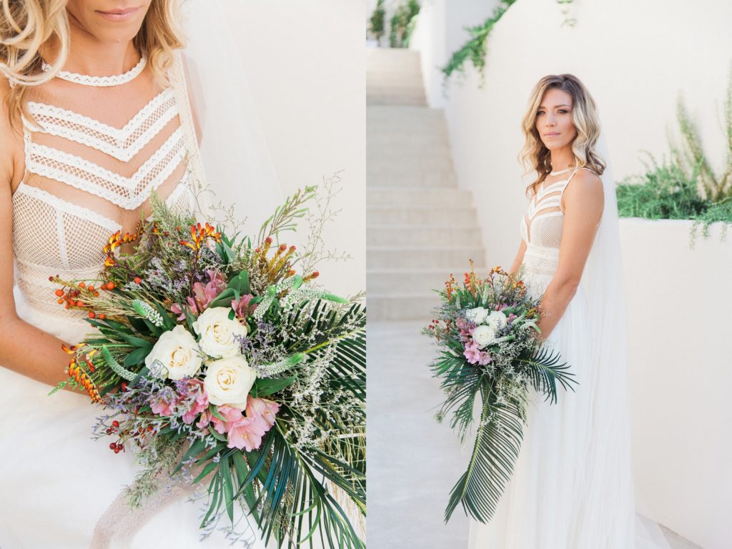 Bride in an ivory Atelier Zolotas gown with a boho bridal bouquet
