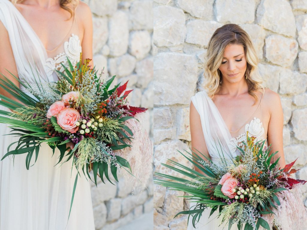 Bride in an Atelier Zolotas wedding gown with a boho bouquet featuring roses, palm leaves and pampas grass