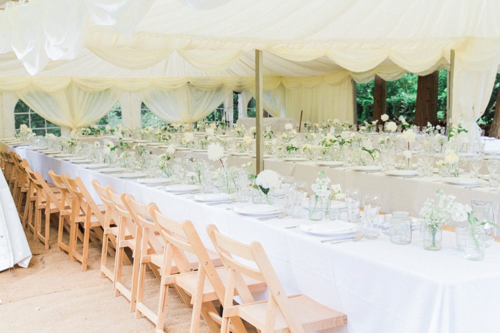 Marquee wedding set-up in the garden of a private residence in the English countryside