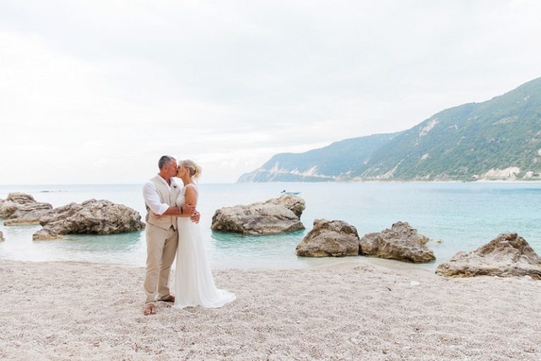 Bride and Groom Kissing on the Beach in Agios Nikitas Lefkada