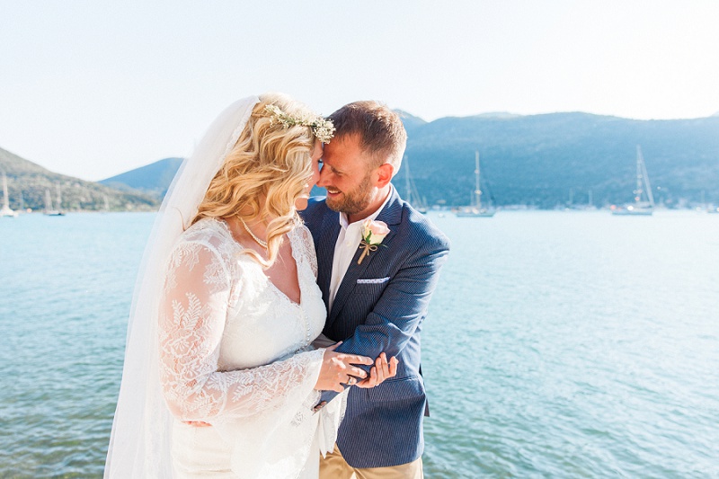 Bride and Groom Against Blue Greek Sea