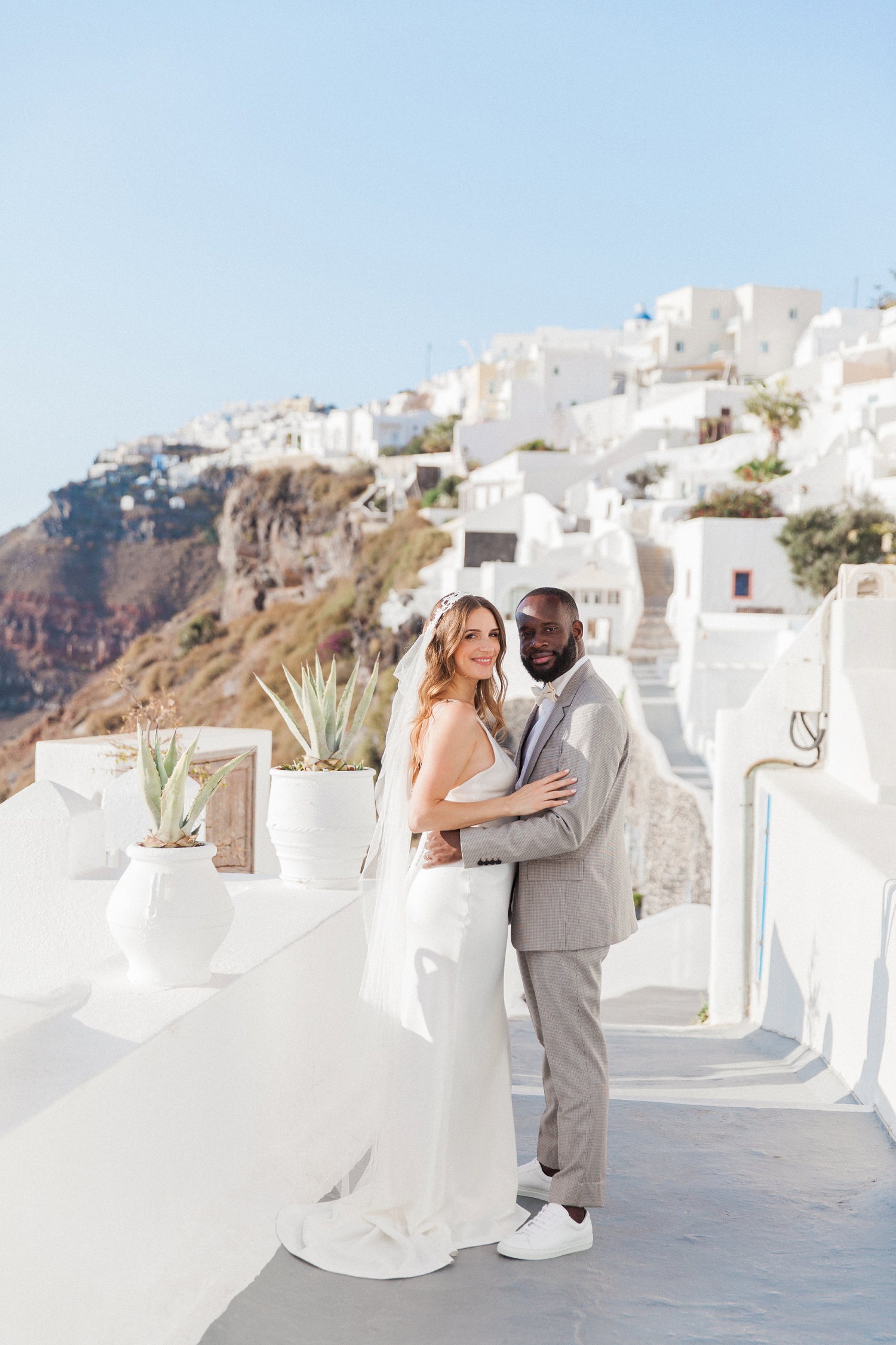 Miabella and Jean-Marc during their Dana Villas Santorini elopement in Greece