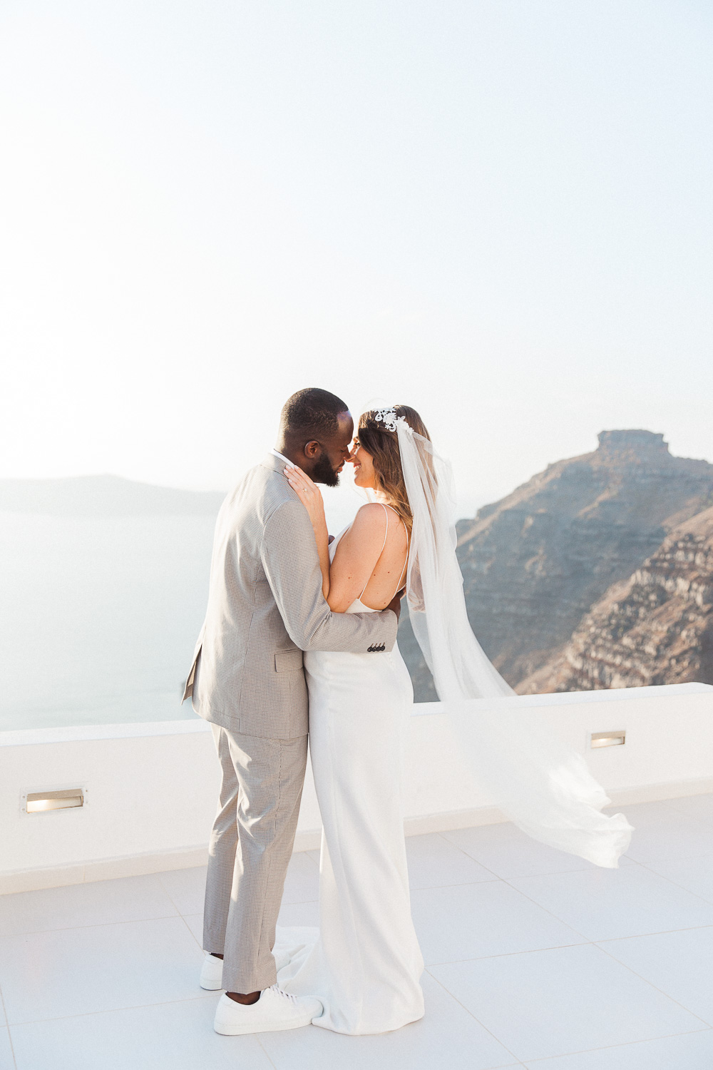 Bride and groom dancing at their Santorini wedding