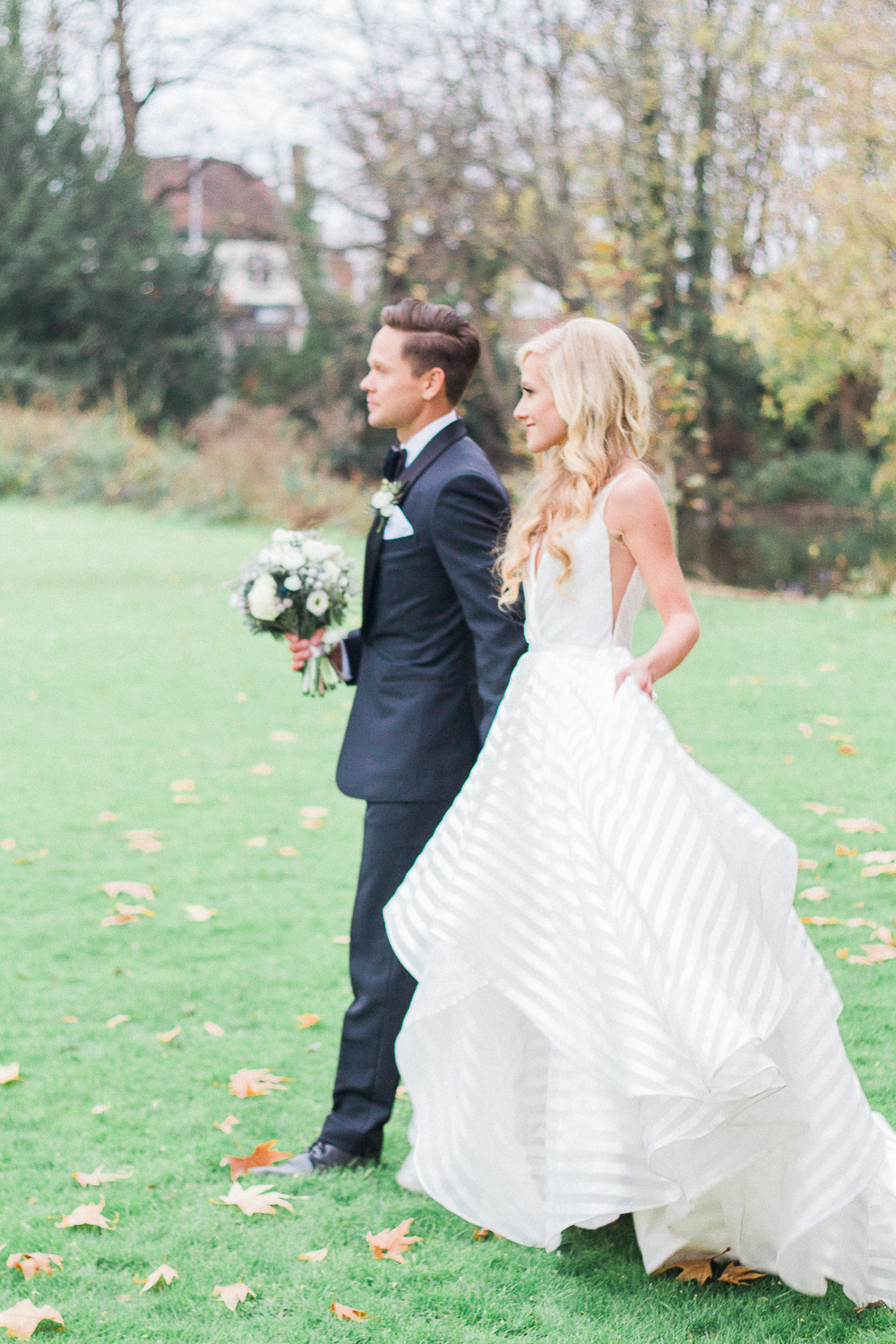 Bride and groom in the grounds of Morden Hall wedding venue in London