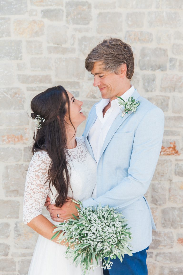 Happy couple during their villa elopement on Lefkada island in Greece