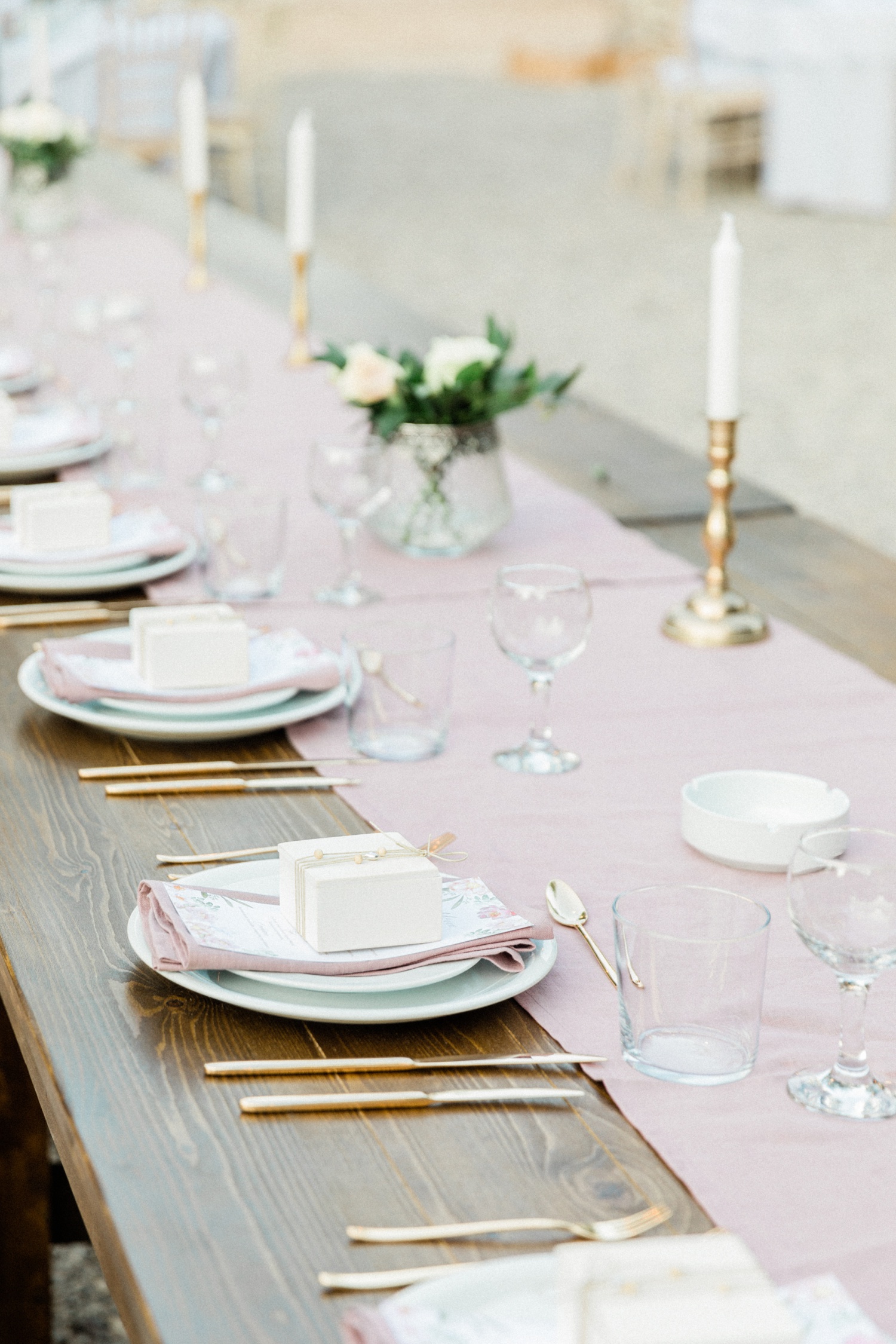 Rustic place settings on a top table at an olive grove wedding in Ithaca