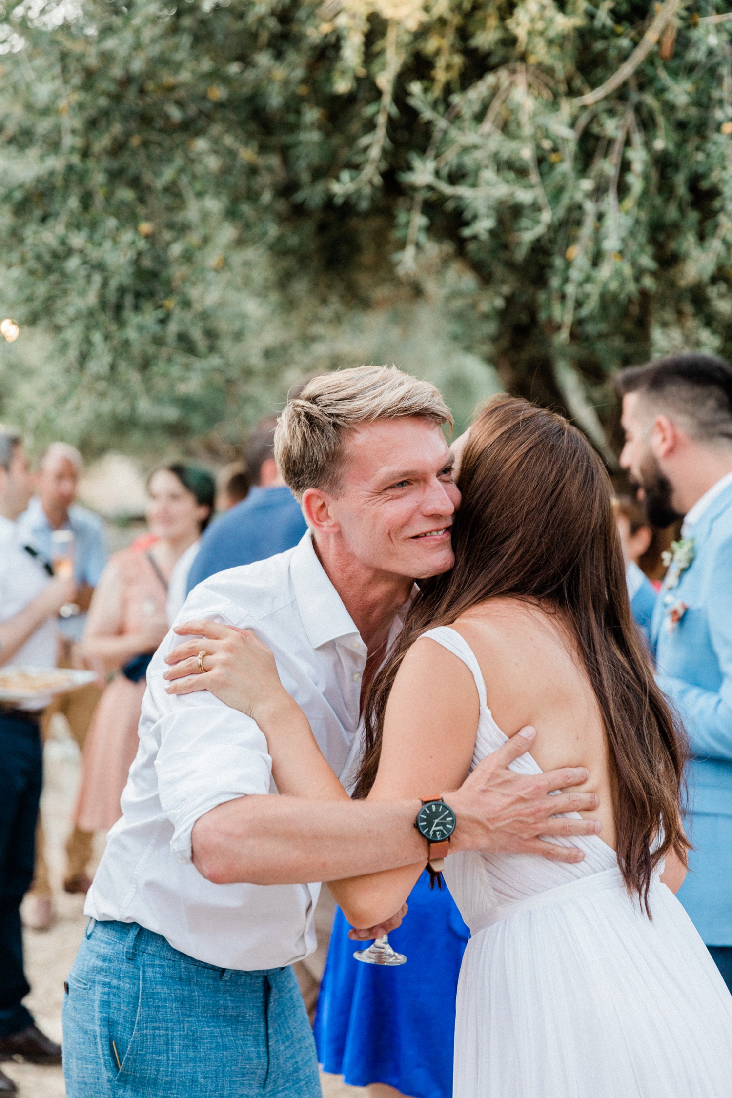 Guests congratulates the bride during the wedding cocktail hour